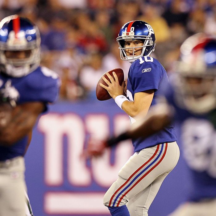 EAST RUTHERFORD, NJ - AUGUST 29: Eli Manning #10 of the New York Giants in action against the New York Jets during their pre season game on August 29, 2011 at MetLife Stadium in East Rutherford, New Jersey. (Photo by Jim McIsaac/Getty Images)