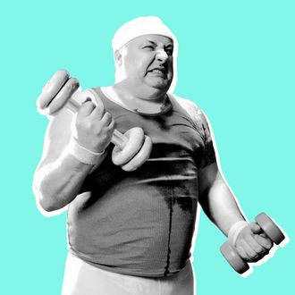 Large man lifting weights