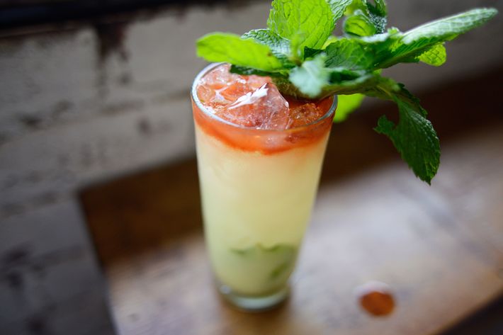 The Synthetic Happiness combines gin, coconut, saffron, lime, and mint.