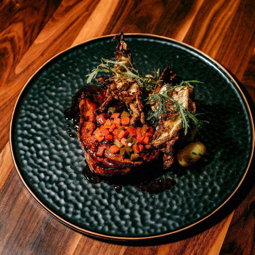 Heritage pork with cabbage and cherry peppers.