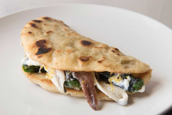 House-made flatbread with anchovies, charred shishito peppers, and aioli.