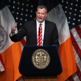 NEW YORK, NY - FEBRUARY 10: New York City Mayor Bill de Blasio gives the State of the City address at La Guardia Community College on February 10, 2014 in the Long Island City section of the Queens borough of New York City. In his first address as Mayor of New York, de Blasio plans to outline his vision for fighting the widening income inequality gap and intends to urge lawmakers to raise the minimum wage. (Photo by John Moore/Getty Images)