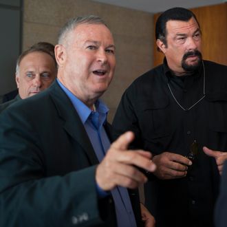 Rep. Dana Rohrabacher, foreground, who is leading a U.S. Congressional delegation to the Russian Federation, U.S. actor Steven Seagal, right, and Rep. Steve King, left, speak to the media after a news conference in U.S. Embassy in Moscow, Russia, Sunday, June 2, 2013. A U.S. Congressional delegation to Russia learned little about what could have been done to prevent the Boston Marathon bombings, but got to hang out with Steven Seagal. Rep. Dana Rohrabacher, a California Republican who led the six-person delegation this week, said at a press conference Sunday that there was “nothing specific” that could have helped April’s bombings, but that the U.S. and Russia needed to work more closely on joint security threats.(AP Photo/Alexander Zemlianichenko)