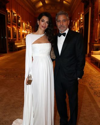Amal and George Clooney at Buckingham Palace.