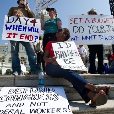 Federal workers demonstrate against the government shutdown in front of the US Capitol in Washington on October 4, 2013. The US government shut down for the first time in 17 years on October 1 after lawmakers failed to reach a budget deal by the end of the fiscal year.