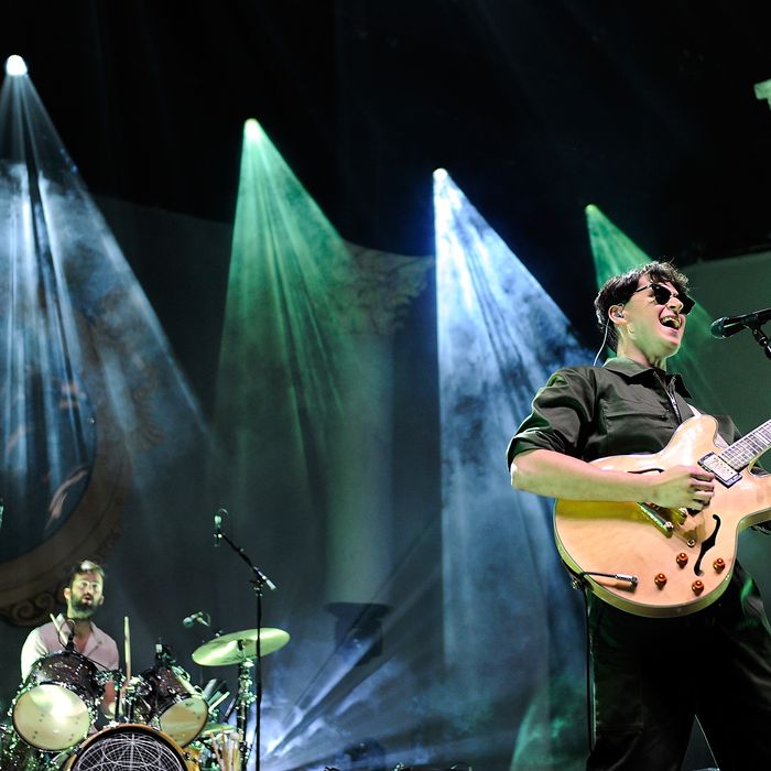 LONDON, ENGLAND - NOVEMBER 13: Chris Tomson (L) and Ezra Koenig of Vampire Weekend performs at 02 Arena on November 13, 2013 in London, England. (Photo by Matt Kent/WireImage)