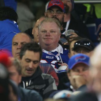 TORONTO, ON - DECEMBER 1: Toronto Mayor Rob Ford watches the Buffalo Bills NFL game against the Atlanta Falcons at Rogers Centre on December 1, 2013 in Toronto, Ontario. (Photo by Tom Szczerbowski/Getty Images)