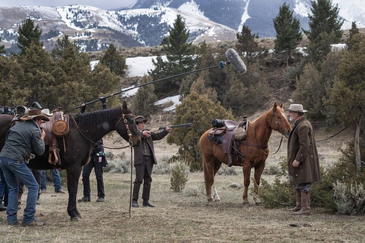 Patrick Scott McDermott, an actor who was recast, points a replica rifle at Alec Baldwin on the set of “Rust” at the Yellowstone Film Ranch in Pray, Mont., on April 22, 2023. (Todd Heisler/The New York Times)