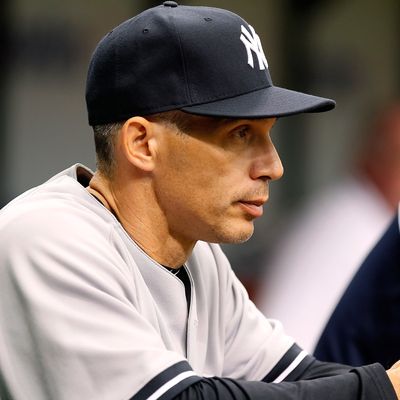 Manager Joe Girardi #28 of the New York Yankees directs his team against the Tampa Bay Rays