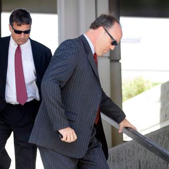 FORT LAUDERDALE, FL - AUGUST 21: Bradley Birkenfeld (R) walks down the steps of the federal courthouse with his lawyer David E. Meier after he was sentenced to 40 months in prison by the judge on August 21, 2009 in Fort Lauderdale, Florida. Birkenfeld is a former UBS private banker who was a key informant for the U.S. government in tax evasion case against the Swiss bank, who was helping wealthy Americans dodge income taxes through secret accounts. (Photo by Joe Raedle/Getty Images) *** Local Caption *** Bradley Birkenfeld;David Meier