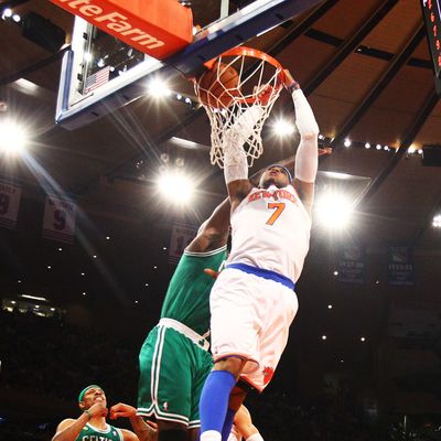 NEW YORK, NY - MAY 01: Carmelo Anthony #7 of the New York Knicks dunks the ball against the Boston Celtics during Game five of the Eastern Conference Quarterfinals of the 2013 NBA Playoffs at Madison Square Garden on May 1, 2013 in New York City. NOTE TO USER: User expressly acknowledges and agrees that, by downloading and or using this photograph, User is consenting to the terms and conditions of the Getty Images License Agreement. (Photo by Al Bello/Getty Images)