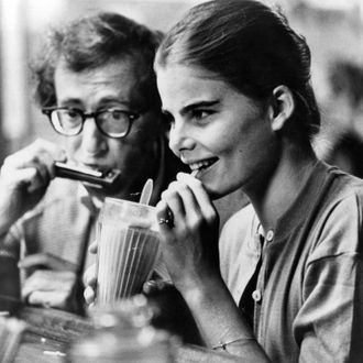 Woody Allen plays harmonica to Mariel Hemingway in a scene from the film 'Manhattan' 1979. (Photo by United Artists/Getty Images)
