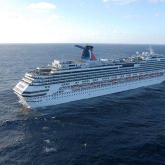 AT SEA - NOVEMBER 9: In this photo provided by the U.S. Navy, Carnival cruise ship C/V Splendor sits November 9, 2010 off the coast California. The aircraft carrier USS Ronald Reagan, was diverted from its current training maneuvers to a position south near the Carnival cruise ship to facilitate the delivery of 4,500 pounds of supplies to the cruise ship which lost power and became stranded early Monday after a fire in the engine room. (Photo by Dylan McCord/U.S. Navy via Getty Images)