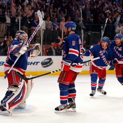 NEW YORK, NY - MAY 12: (L-R) Goalie Henrik Lundqvist #30, Dan Girardi #5, Ryan McDonagh #27 and Brad Richards #19 of the New York Rangers celebrate after they won 2-1 against the Washington Capitals in Game Seven of the Eastern Conference Semifinals during the 2012 NHL Stanley Cup Playoffs at Madison Square Garden on May 12, 2012 in New York City. (Photo by Paul Bereswill/Getty Images)