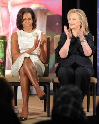 US First Lady Michelle Obama (R) and Secretary of State Hillary Clinton attend the 2012 International Women of Courage Awards ceremony at the State Department in Washington, DC, on March 8, 2012. The prestigious Secretary of State?s Award for International Women of Courage annually recognizes women around the globe who have shown exceptional courage and leadership in advocating for women?s rights and empowerment, often at great personal risk.
