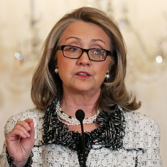 Secretary of State Hillary Clinton speaks about women's issues during an event at the State Department, January 31, 2013 in Washington DC. Secretary Clinton is an Ambassador at large for Global Women's Issues and helped the group launch four new initiatives valued at up to 86.5 million dollars. 