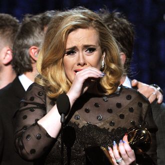 LOS ANGELES, CA - FEBRUARY 12: Singer Adele accepts the Album of the Year Award for 