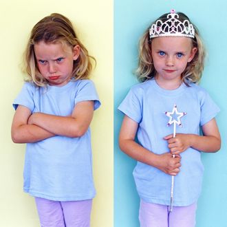 Sister Pouting Over Her Twin Sister's Crown and Magic Wand