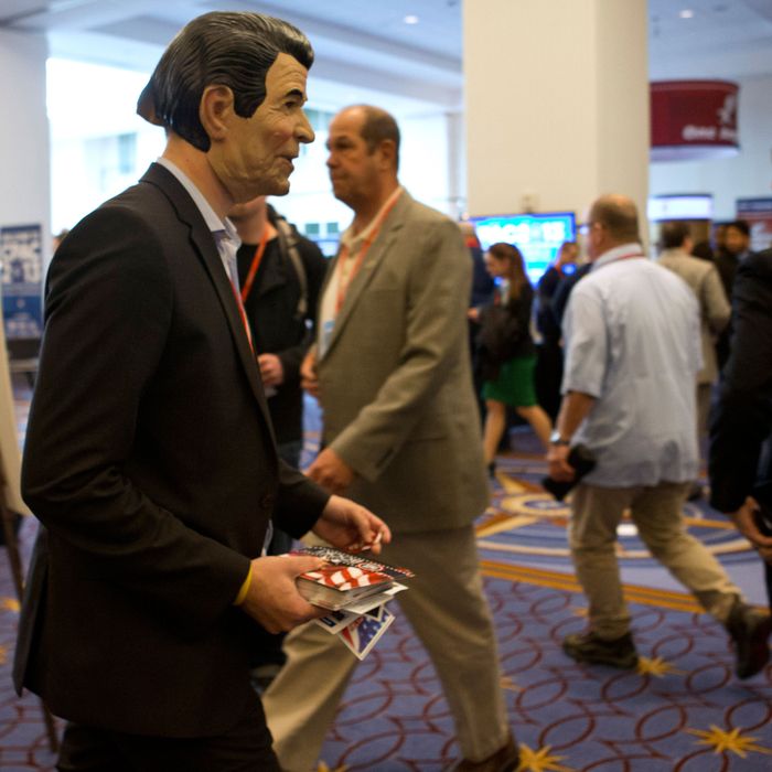 A man wearing a mask of former President A man wearing a mask of former President Ronald Reagan walks through the exhibit hall during the 40th annual Conservative Political Action Conference in National Harbor, Md., Friday, March 15, 2013. walks through the exhibit hall during the 40th annual Conservative Political Action Conference in National Harbor, Md., Friday, March 15, 2013. (AP Photo/Jacquelyn Martin)