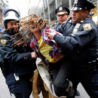 An Occupy Wall Street demonstrator is arrested by New York City Police during what protest organizers called a 