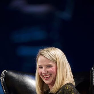 Marissa Mayer, president and chief executive officer of Yahoo! Inc., reacts during the DreamForce Conference in San Francisco, California, U.S., on Tuesday, Nov. 19, 2013. Yahoo boosted its stock-buyback plan by $5 billion, returning more cash to shareholders as Mayer seeks to revive growth at the largest U.S. Internet portal. 