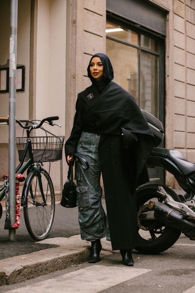 Woman with pink fur coat and brown Louis Vuitton bag before John Richmond  fashion show, Milan Fashion Week street style – Stock Editorial Photo ©  AndreaA. #272372864