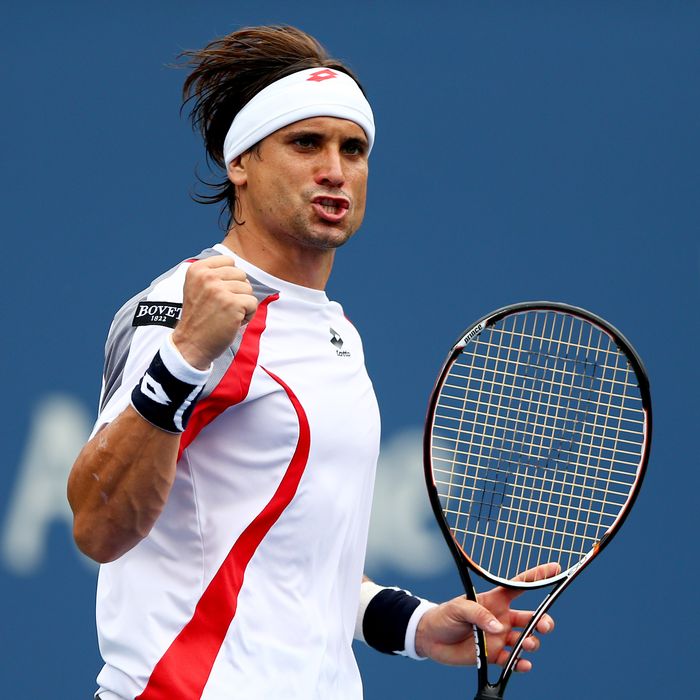 David Ferrer of Spain celebrates a point against Janko Tipsarevic of Serbia during their men's singles quarterfinal match Day Eleven of the 2012 US Open at USTA Billie Jean King National Tennis Center on September 6, 2012 in the Flushing neighborhood of the Queens borough of New York City.