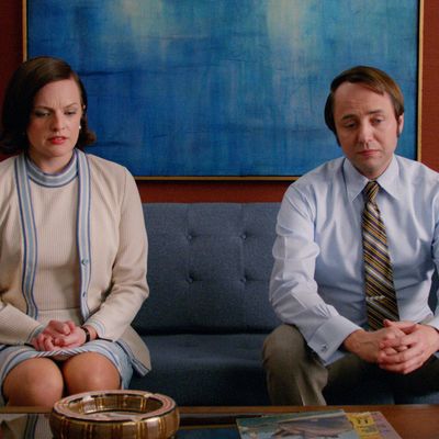 Elisabeth Moss as Peggy Olson and Vincent Kartheiser as Pete Campbell - Mad Men _ Season 7B, Episode 11 - Photo Credit: Courtesy of AMC