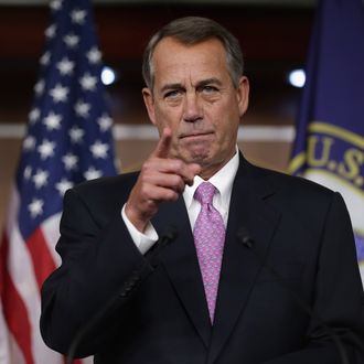 WASHINGTON, DC - DECEMBER 05: Speaker of the House John Boehner (R-OH) answers reporters questions during his weekly news conference in the Capitol Visitors Center at the U.S. Capitol December 5, 2013 in Washington, DC. When asked about the Republican Party's running against women, Boehner said, 