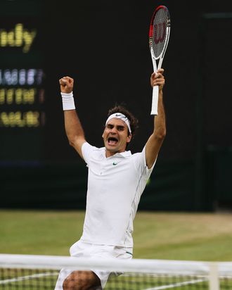 LONDON, ENGLAND - JULY 08: Roger Federer of Switzerland celebrates match point during his Gentlemen's Singles final match against Andy Murray of Great Britain on day thirteen of the Wimbledon Lawn Tennis Championships at the All England Lawn Tennis and Croquet Club on July 8, 2012 in London, England. (Photo by Julian Finney/Getty Images)