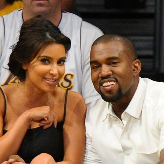LOS ANGELES, CA - MAY 12: Kim Kardashian (L) and Kanye West attend the Los Angeles Lakers and Denver Nuggets Game 7 of the Western Conference Quarterfinals in the 2012 NBA Playoffs on May 12, 2012 at Staples Center in Los Angeles, California. (Photo by Noel Vasquez/Getty Images)