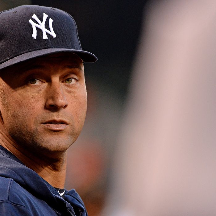 BALTIMORE, MD - SEPTEMBER 10: Derek Jeter #2 of the New York Yankees looks on from the dugout during an MLB game between the Baltimore Orioles and the New York Yankees at Oriole Park at Camden Yards on September 10, 2013 in Baltimore, Maryland.(Photo by Patrick Smith/Getty Images)