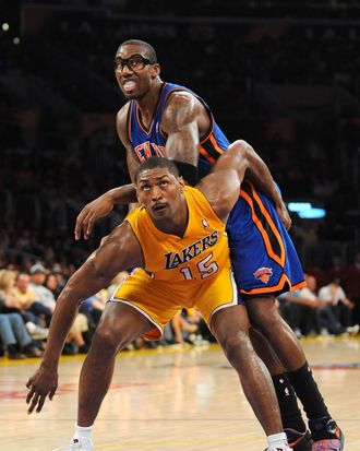 LOS ANGELES, CA - DECEMBER 29: Metta World Peace #15 of the Los Angeles Lakers boxes out against Amar'e Stoudemire #1 of the New York Knicks at Staples Center on December 29, 2011 in Los Angeles, California. NOTE TO USER: User expressly acknowledges and agrees that, by downloading and/or using this Photograph, user is consenting to the terms and conditions of the Getty Images License Agreement. Mandatory Copyright Notice: Copyright 2011 NBAE (Photo by Juan Ocampo/NBAE via Getty Images)