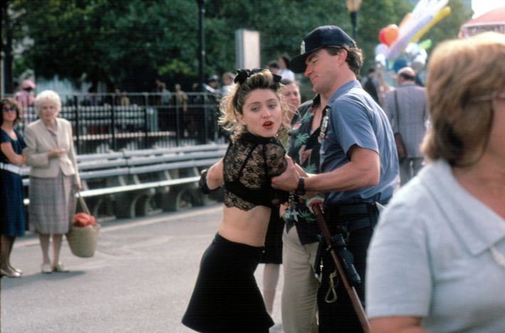 Desperately Seeking Susan (1985) Bras in public, layered crucifix  necklaces, lace gloves. Madonna set a trend that wom…