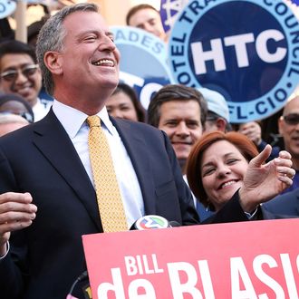 NEW YORK, NY - SEPTEMBER 17: Democratic mayoral nominee Bill de Blasio (L) laughs with Christine Quinn (2nd R), New York City Council Speaker and former mayoral hopeful, at a news conference where Quinn endorsed de Blasio outside City Hall on September 17, 2013 in New York City. De Blasio will face Republican Joseph Lhota in the general mayoral election November 5, 2013, with the winner succeeding current Mayor Michael Bloomberg. (Photo by Mario Tama/Getty Images)