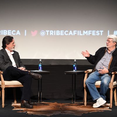 NEW YORK, NY - APRIL 17: George Lucas (R) and Stephen Colbert speak onstage at Tribeca Talks: Director Series: George Lucas With Stephen Colbert during the 2015 Tribeca Film Festival at BMCC Tribeca PAC on April 17, 2015 in New York City. (Photo by Jamie McCarthy/Getty Images for the 2015 Tribeca Film Festival )