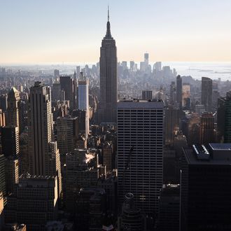 NEW YORK, NY - FEBRUARY 13: The Empire State Building towers over the Manhattan skyline on February 13, 2012 in New York City. The owner of the Empire State Building, Malkin Holdings, plans to raise up to $1 billion in an initial public offering on the 102 story Manhattan landmark. (Photo by John Moore/Getty Images)