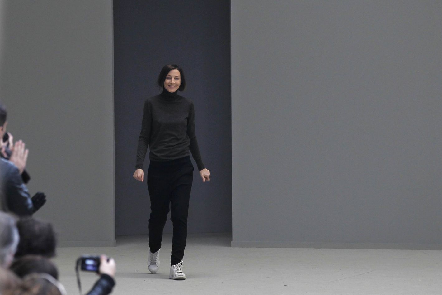 A model displays a creation by fashion designer Phoebe Philo for
