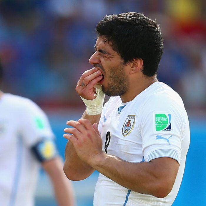 NATAL, BRAZIL - JUNE 24: Luis Suarez of Uruguay reacts during the 2014 FIFA World Cup Brazil Group D match between Italy and Uruguay at Estadio das Dunas on June 24, 2014 in Natal, Brazil. (Photo by Clive Rose/Getty Images)