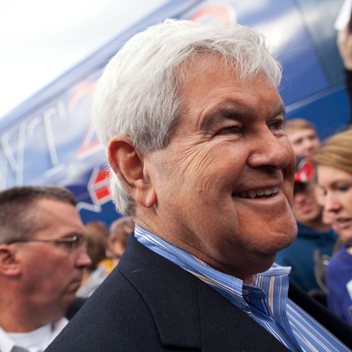 AMES, IA - JANUARY 01: Republican presidential candidate Newt Gingrich meets with supporters outside West Towne Pub on January 1, 2012 in Ames, Iowa. The GOP presidential contenders are crisscrossing Iowa in the final stretch of campaigning in the state before the caucus on January 3, the first test the candidates must face before becoming the Republican presidential nominee. (Photo by Andrew Burton/Getty Images)
