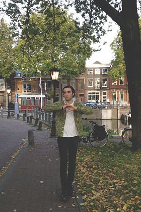 Eric poses near a canal in Utrecht.