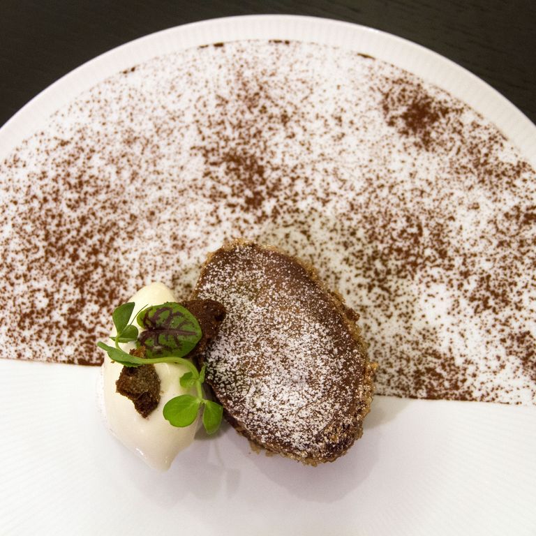 Warm chocolate cake with sesame ganache.