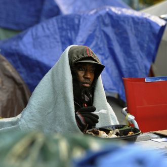 Demonstrators with 'Occupy Wall Street' continue their protest at Zuccotti Park in New York on November 4, 2011. The encampment in the financial district of New York City is now in its second month. The demonstrators are protesting bank bailouts, foreclosures and high unemployment. AFP PHOTO / TIMOTHY A. CLARY (Photo credit should read TIMOTHY A. CLARY/AFP/Getty Images)