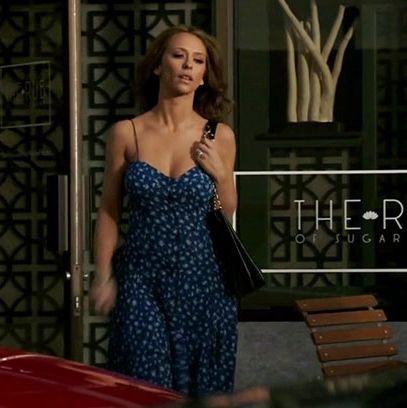 The woman likes a sundress. (PS, the massage parlor where she works is called the Rub. THE RUB.)