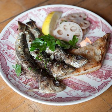 Grilled Sardine with pickled lotus root and tomato rubbed grilled baguette