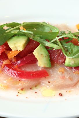 Hamachi ceviche with grapefruit, avocado, and pickled onions.