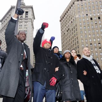 Raymond Santana, right, Kevin Richardson, and Yusef Salaam, left, react to supporters Thursday, Jan. 17, 2013, in New York. The three men who were exonerated in the 1989 Central Park Jogger case, were in court for a hearing in a $250 million federal lawsuit they filed against the city after their sentences were vacated. (AP Photo/Frank Franklin II)
