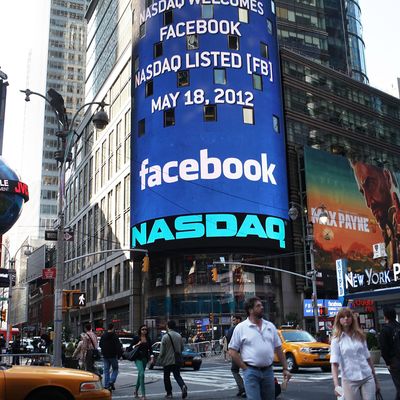 The Nasdaq board in Times Square advertises Facebook which is set to debut on the Nasdaq Stock Market today on May 18, 2012 in New York, United States. The social network site is set to begin trading at roughly 11:00 a.m. ET and on Thursday priced 421 million shares at $38 each. Facebook, a Menlo Park, California based company, will have a valuation exceeding $100 billion.