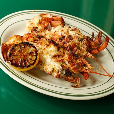 Lobster Thermidor with lemon, Gruyère, and cognac-cream sauce.