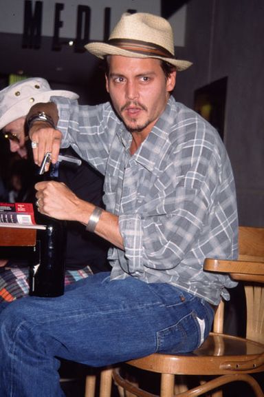 For most of his career, Depp has favored light-colored fedoras.